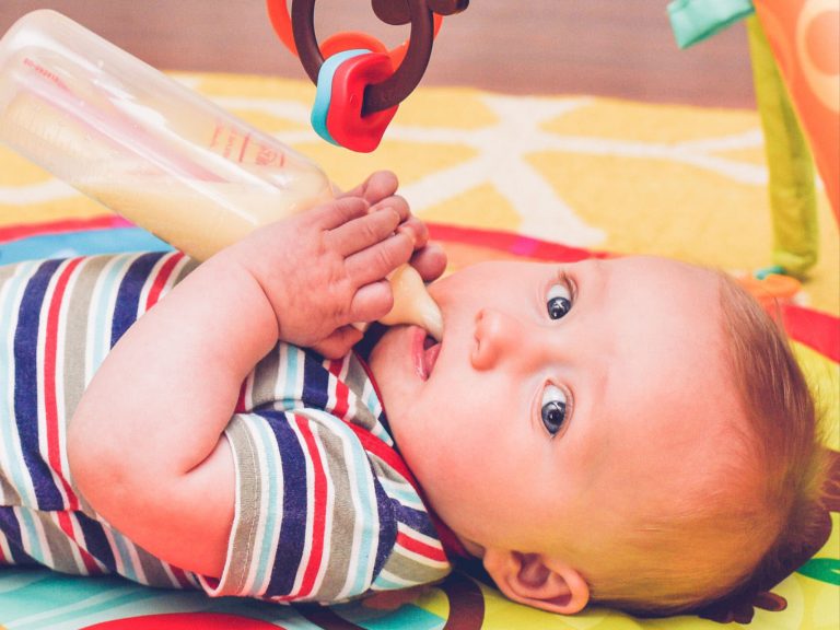 baby boy with bottle