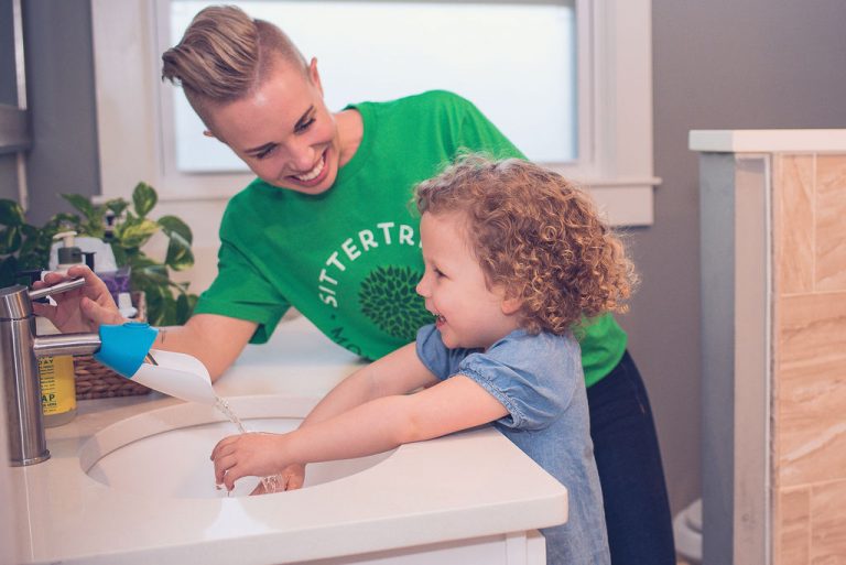 Child washing hands during quarantine - SitterTree