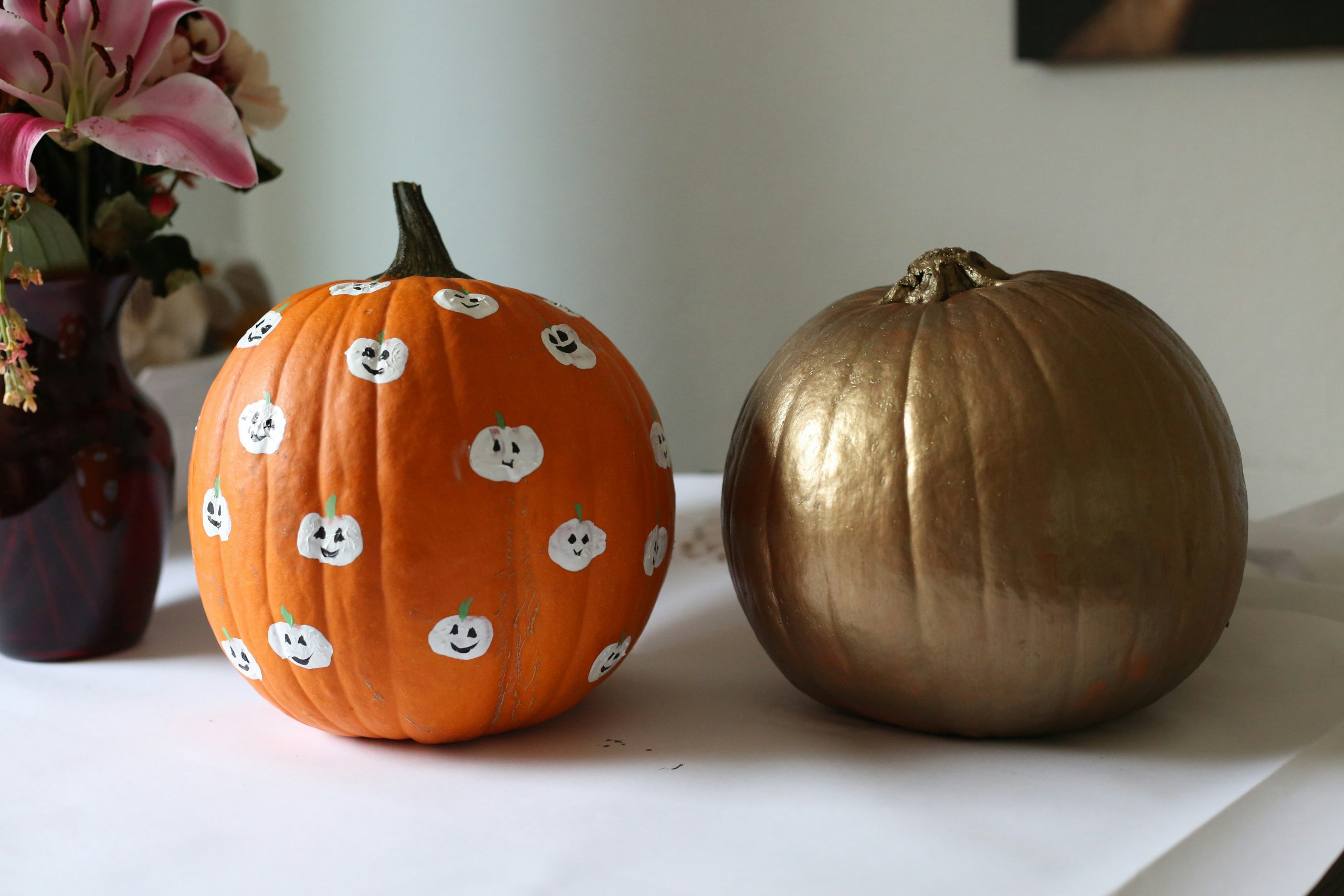 pumpkins painted gold and with a pattern